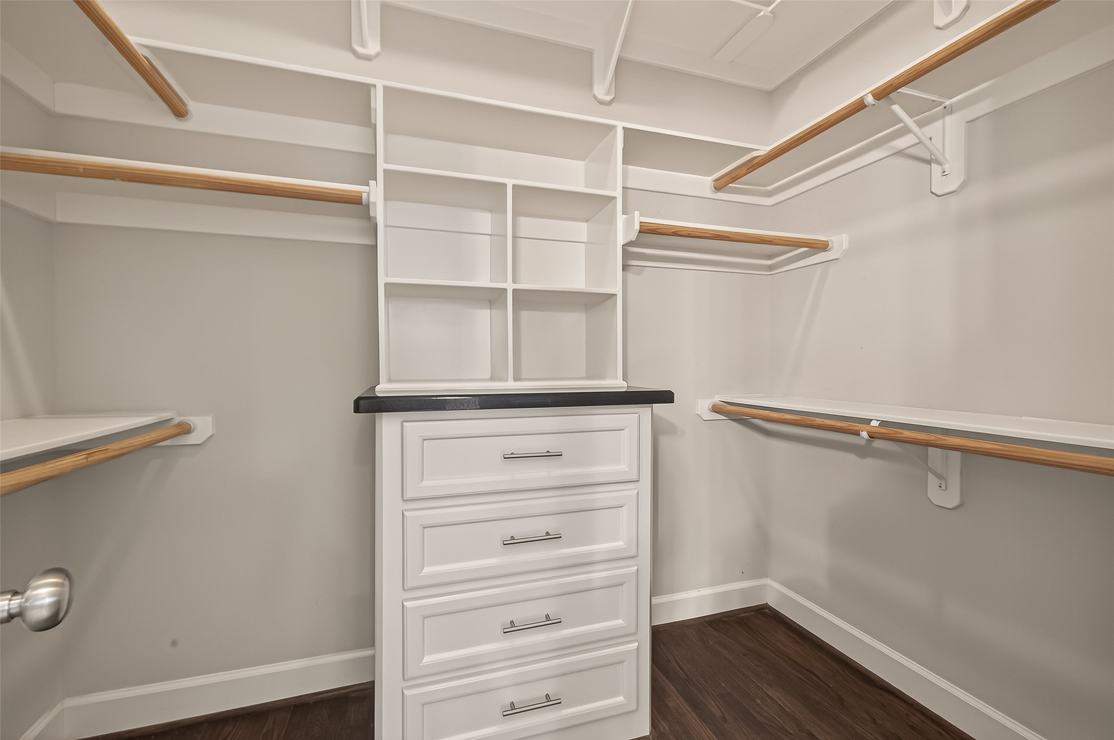 1431 West 25th Street Houston, TX 77008 - Photo 42 of 43 a view of walk in closet with empty racks