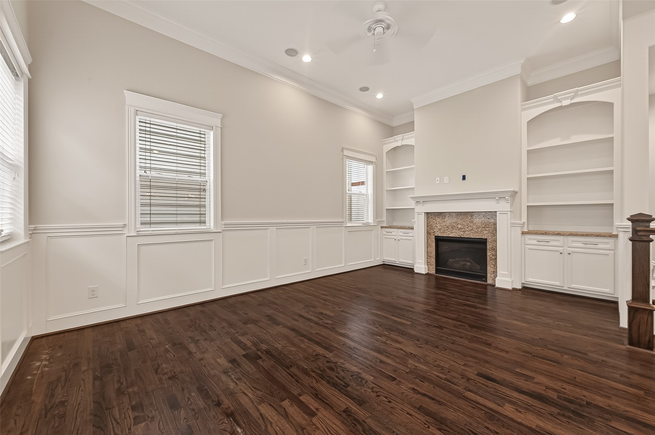 1431 West 25th Street Houston, TX 77008 - Photo 7 of 43 a view of empty room with wooden floor and fireplace