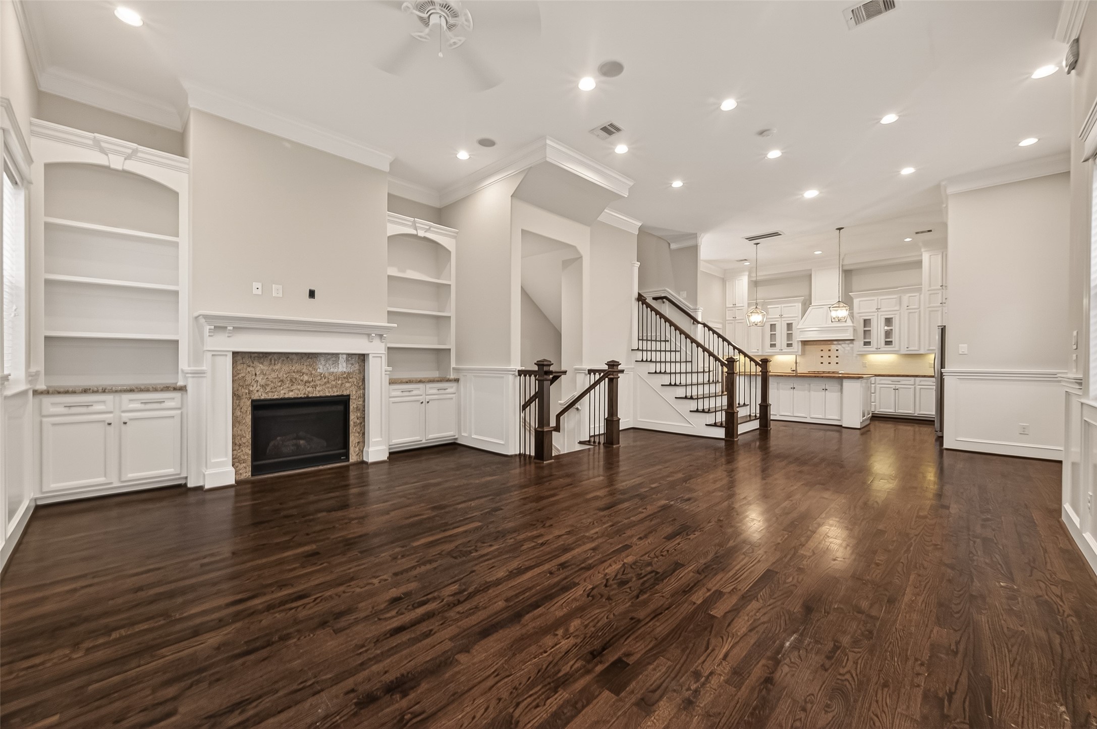 1431 West 25th Street Houston, TX 77008 - Photo 8 of 43 a view of a livingroom with furniture wooden floor and a fireplace