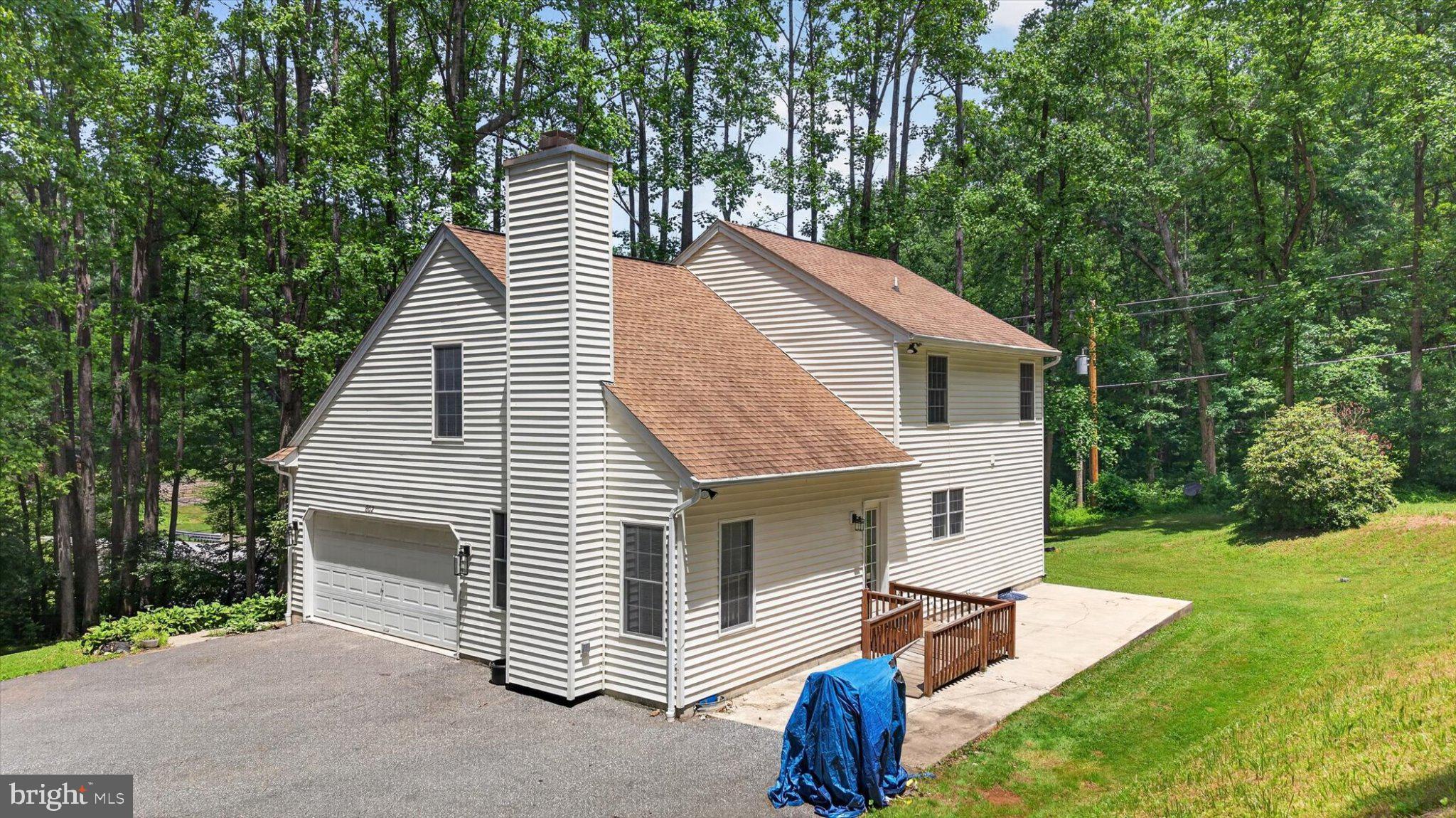 802 Hollow Road Delta, PA 17314 - Photo 32 of 45 Charming home nestled in lush greenery.