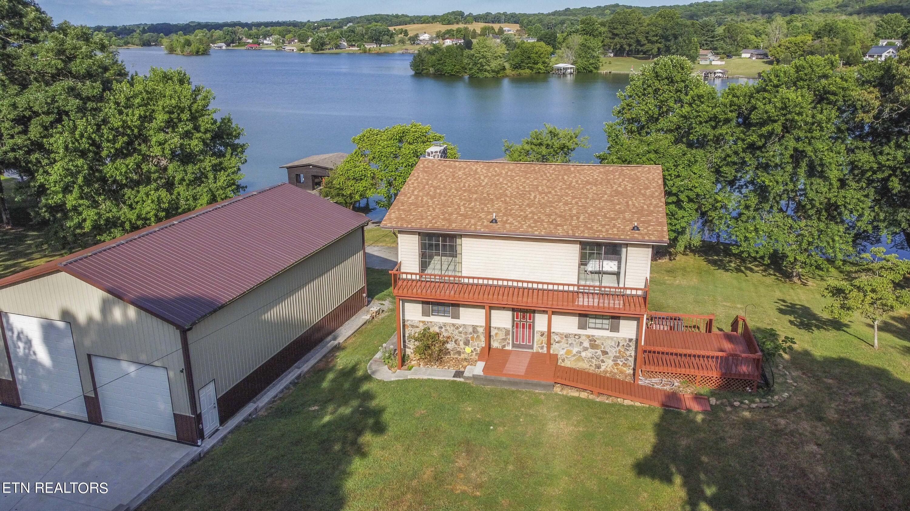 1090 Pin Hook Road Spring City, TN 37381 - Photo 2 of 41 Adorable Cottage and Storage Galore