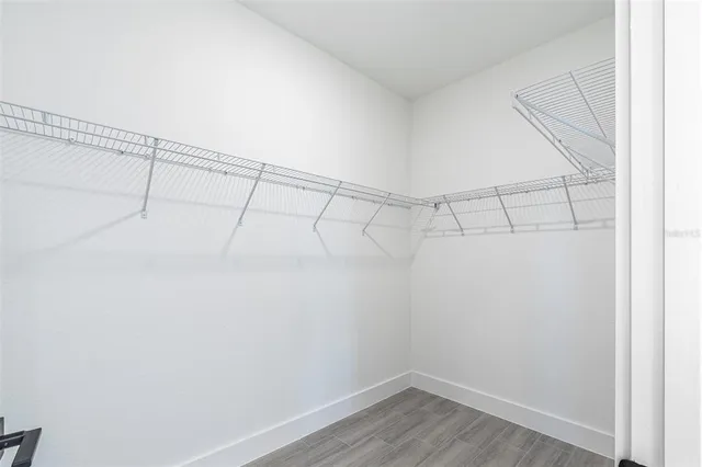 a view of a room with racks on the wall