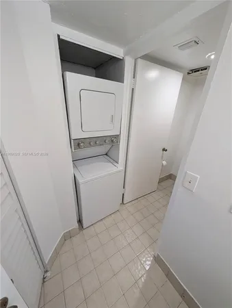 a bathroom with a sink a mirror and vanity