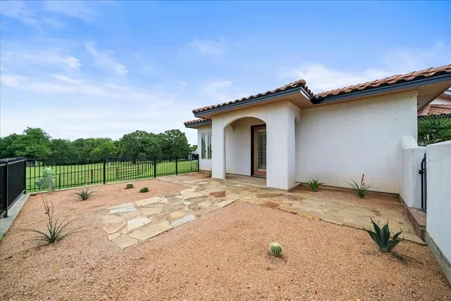 a house view with a garden space