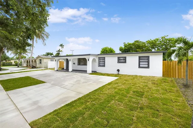 a view of outdoor space yard and front view of a house