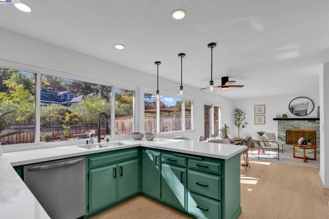 a dinning table and chairs in a room