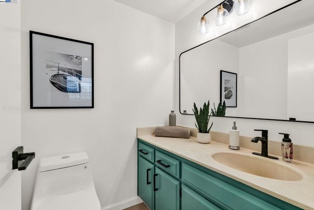 a front view of house with yard and outdoor seating