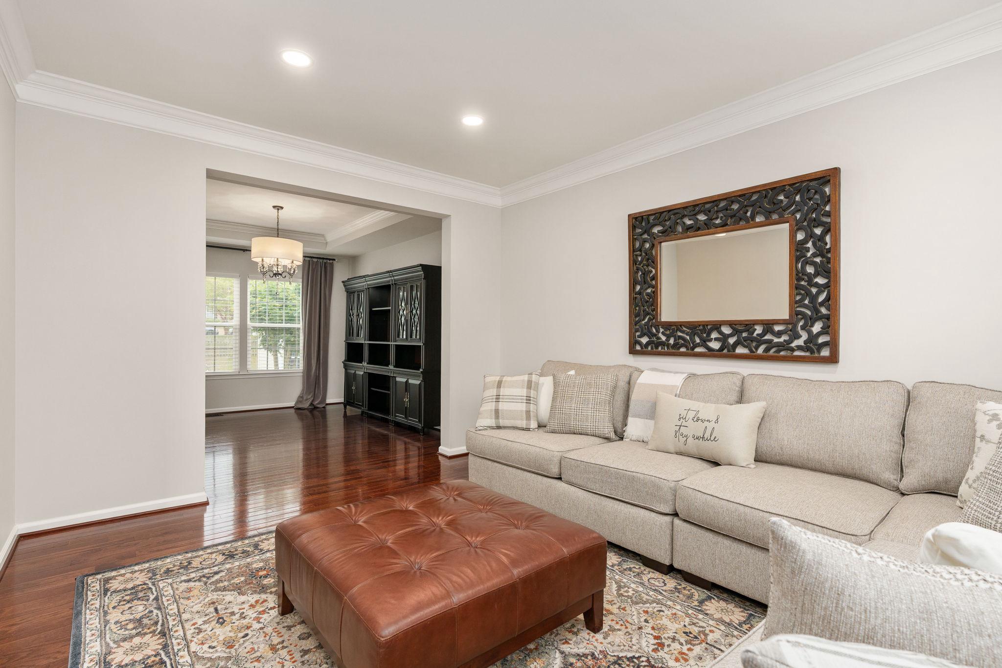 9417 Reservoir Road Fredericksburg, VA 22407 - Photo 10 of 76 a living room with furniture and a rug