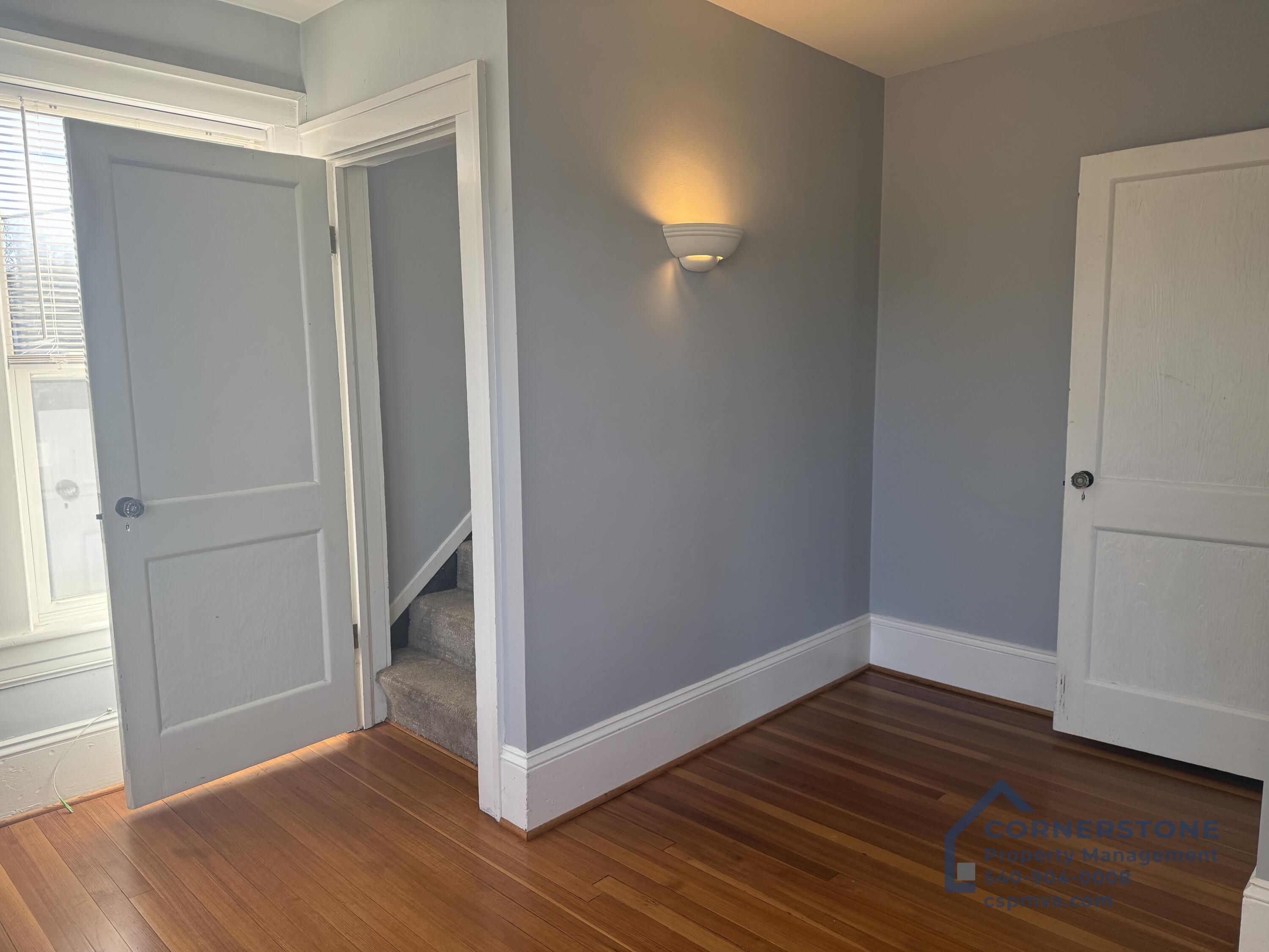 2423 Lofton Road Southwest, Unit 2 Roanoke, VA 24015 - Photo 9 of 14 a view of a room with wooden floor
