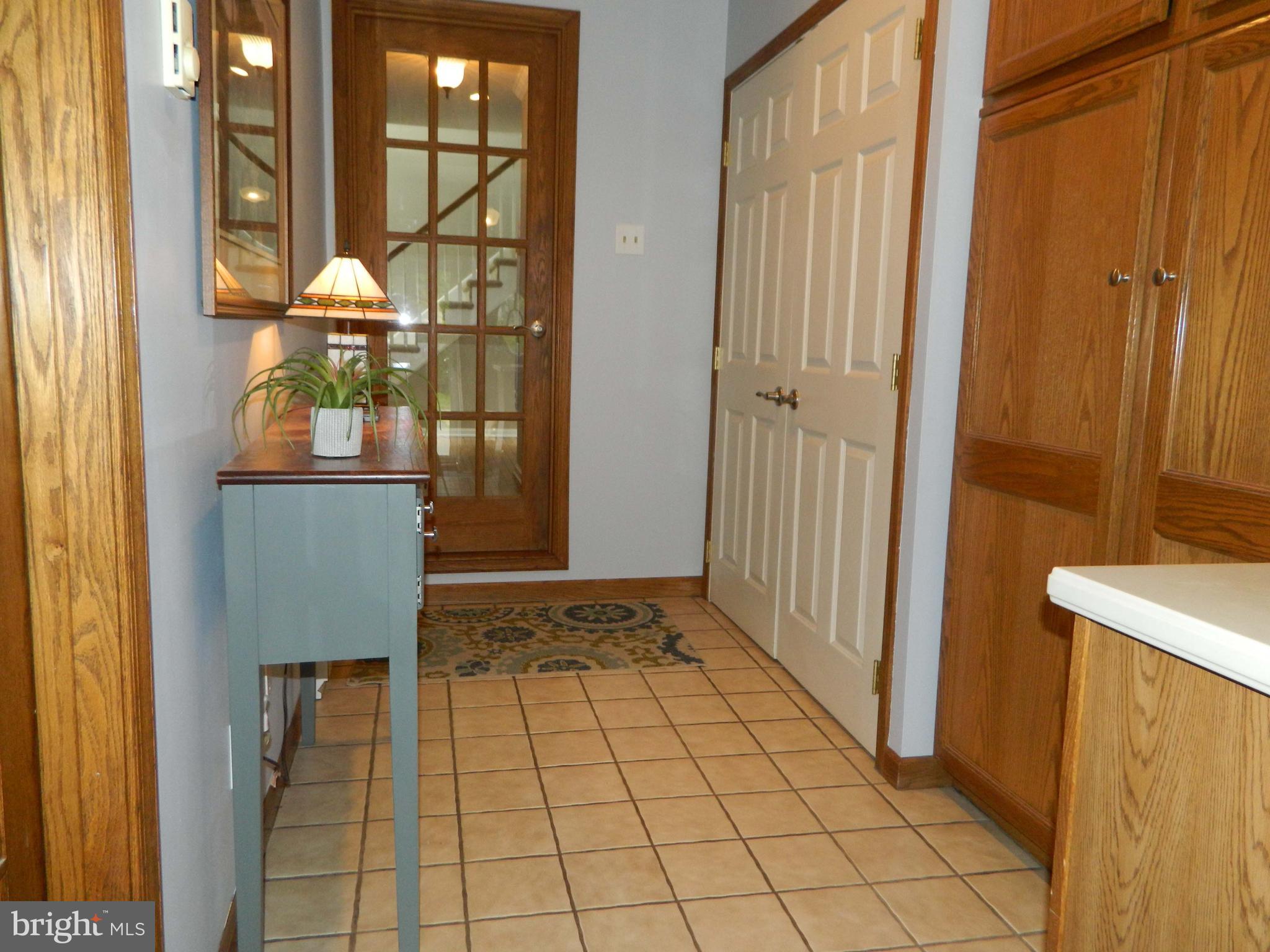 Mudroom with built-in cabinets