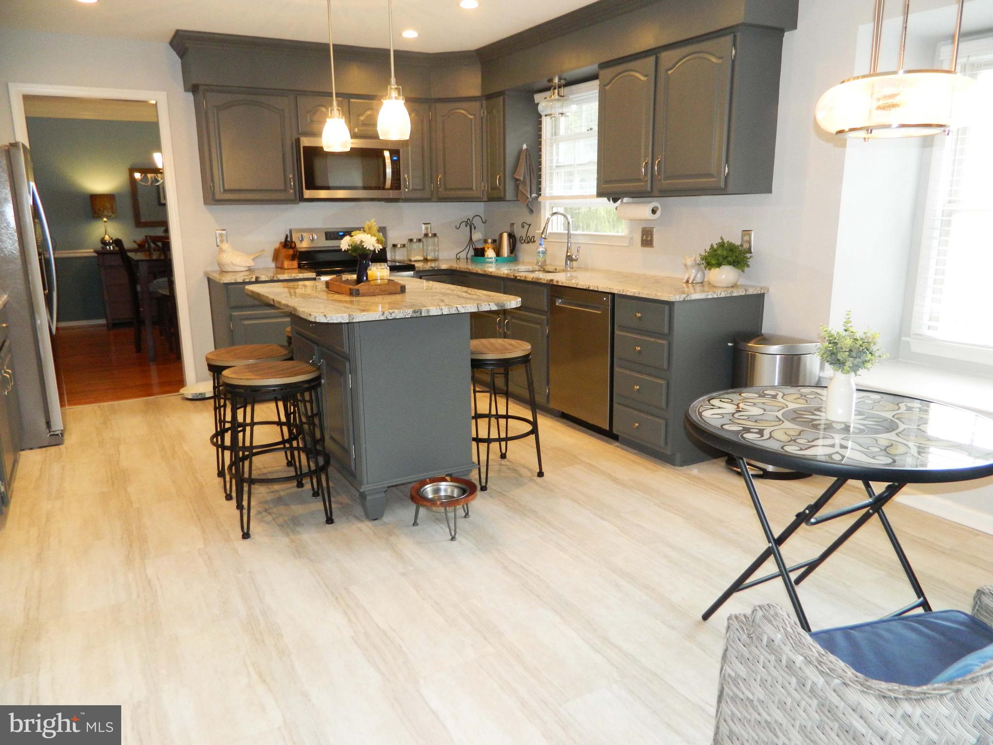 308 Styer Road Glenmoore, PA 19343 - Photo 9 of 22 Kitchen with refinished cabinets & island