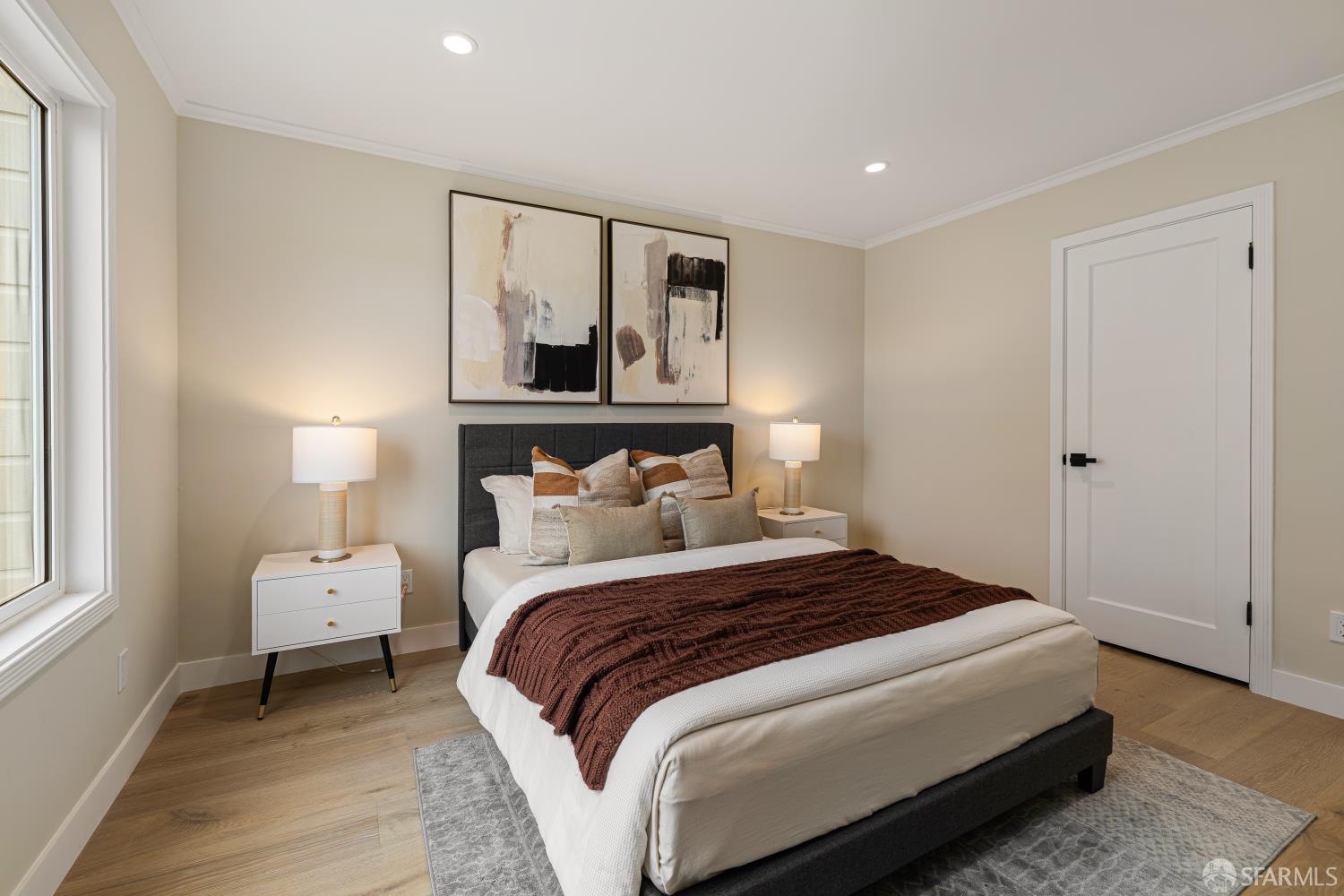 537 Russia Avenue San Francisco, CA 94112 - Photo 30 of 69 a bedroom with a bed and a window