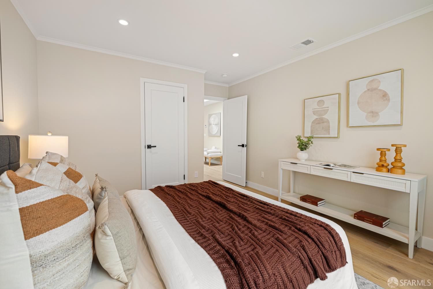 537 Russia Avenue San Francisco, CA 94112 - Photo 31 of 69 a bedroom with a bed and a lamp