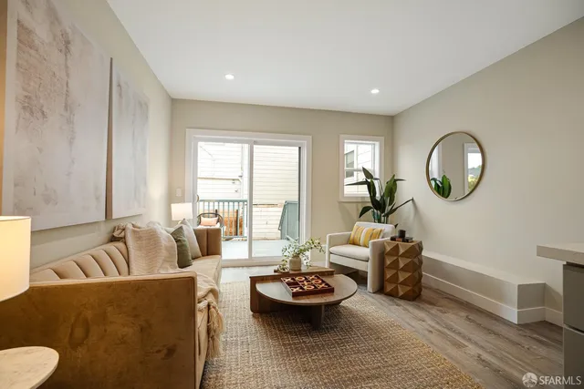 a bedroom with a bed and couch