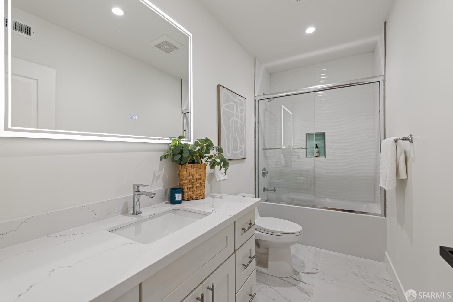 537 Russia Avenue San Francisco, CA 94112 - Photo 45 of 69 a bathroom with a sink a toilet and shower