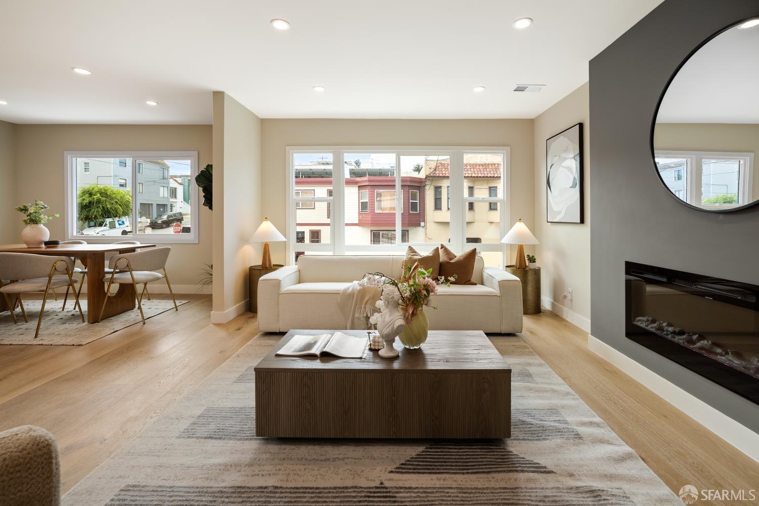 537 Russia Avenue San Francisco, CA 94112 - Photo 10 of 69 a living room with furniture a large window and a fireplace
