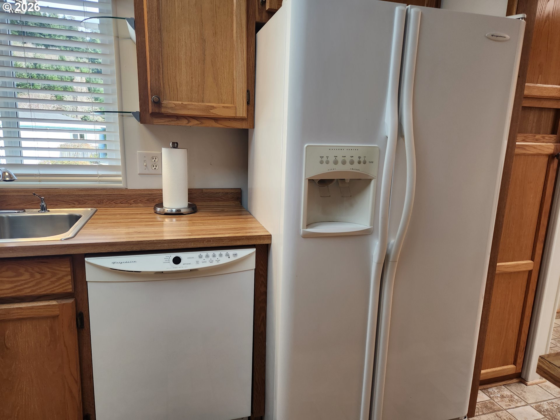 100 River Bend Road, Unit 24 Reedsport, OR 97467 - Photo 16 of 36 a view of a kitchen with appliances and cabinets