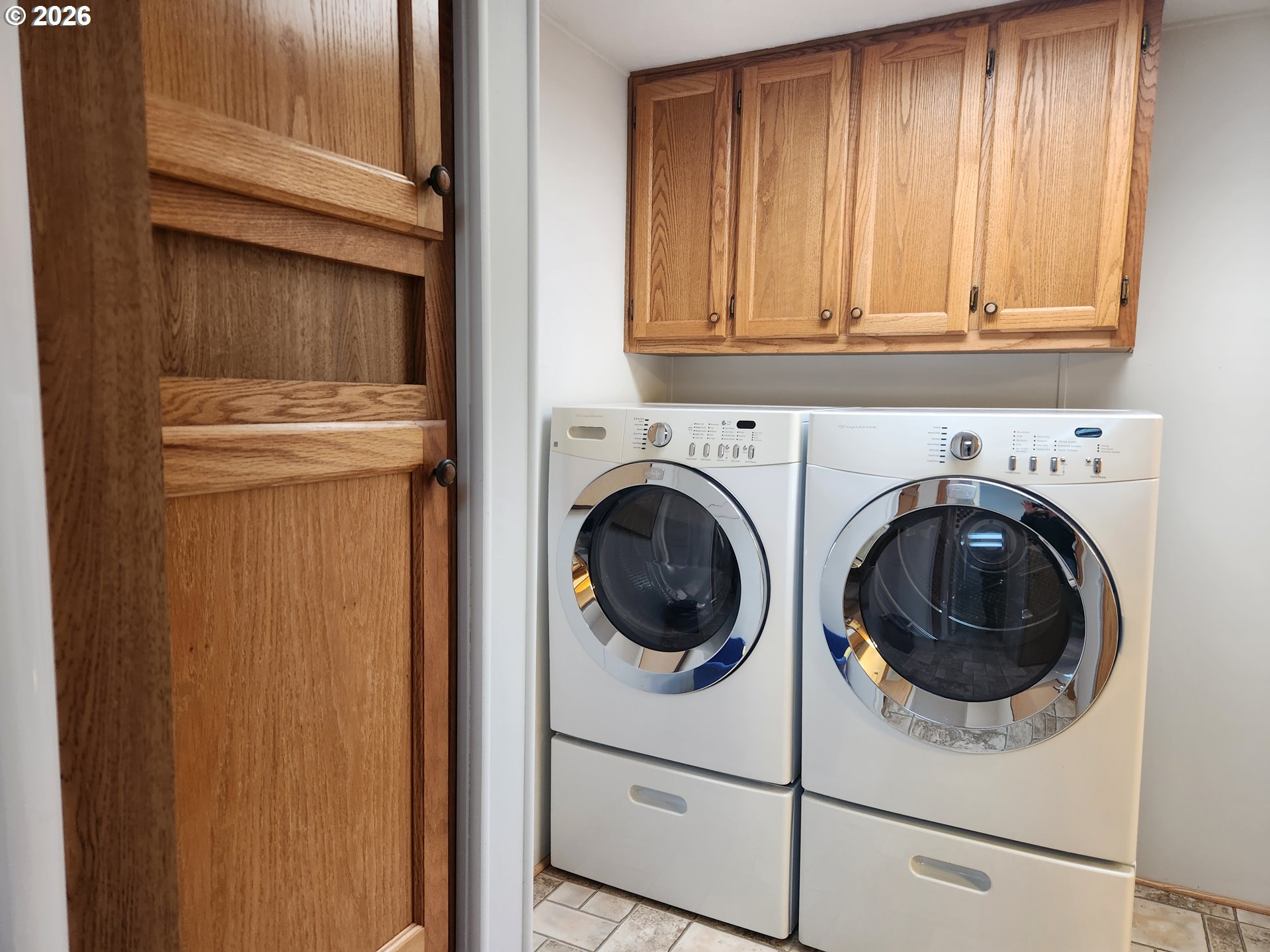 100 River Bend Road, Unit 24 Reedsport, OR 97467 - Photo 18 of 36 a utility room with dryer and washer