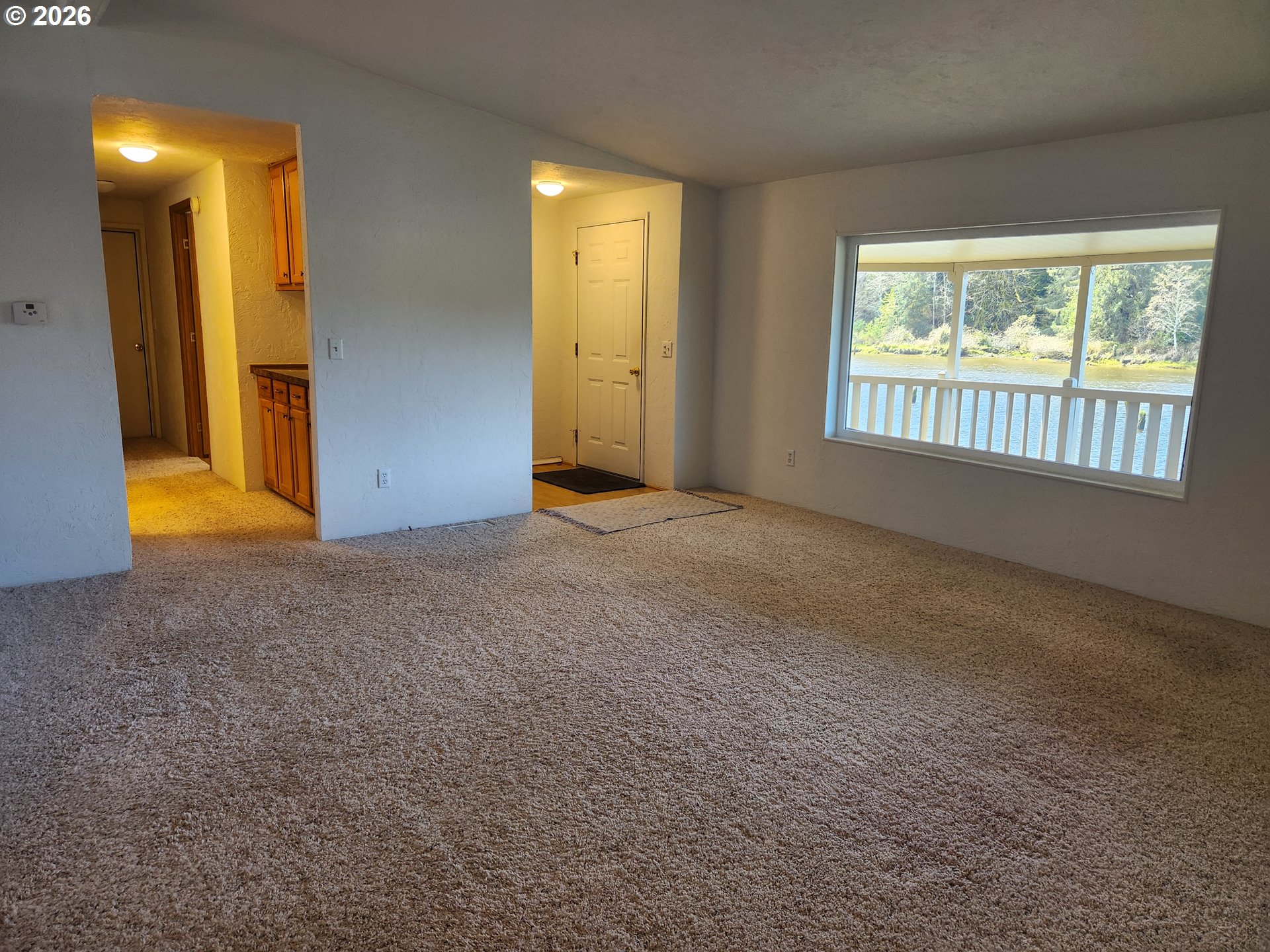 100 River Bend Road, Unit 24 Reedsport, OR 97467 - Photo 26 of 36 a view of an empty room with a window