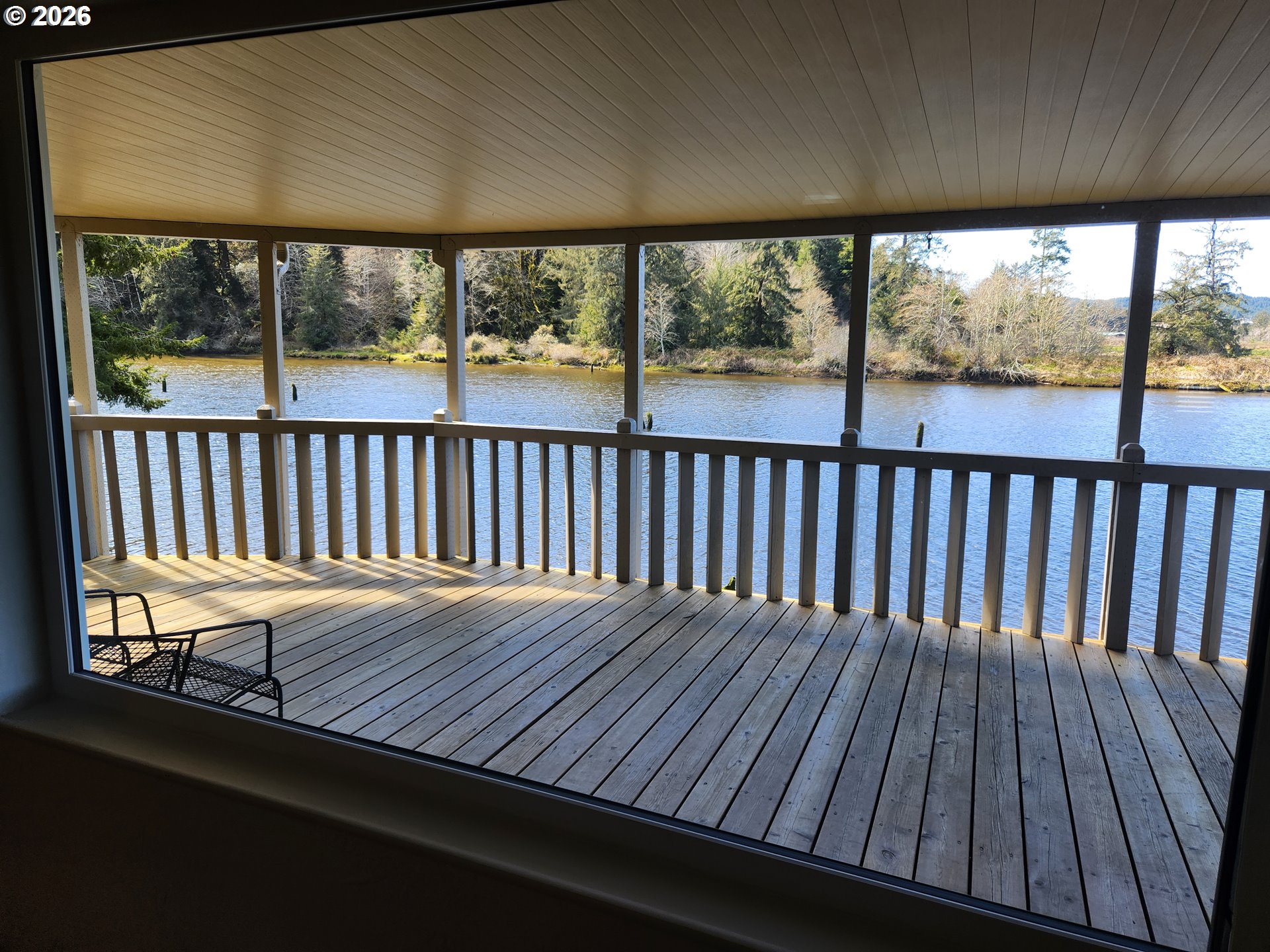 100 River Bend Road, Unit 24 Reedsport, OR 97467 - Photo 27 of 36 a view of balcony with wooden floor