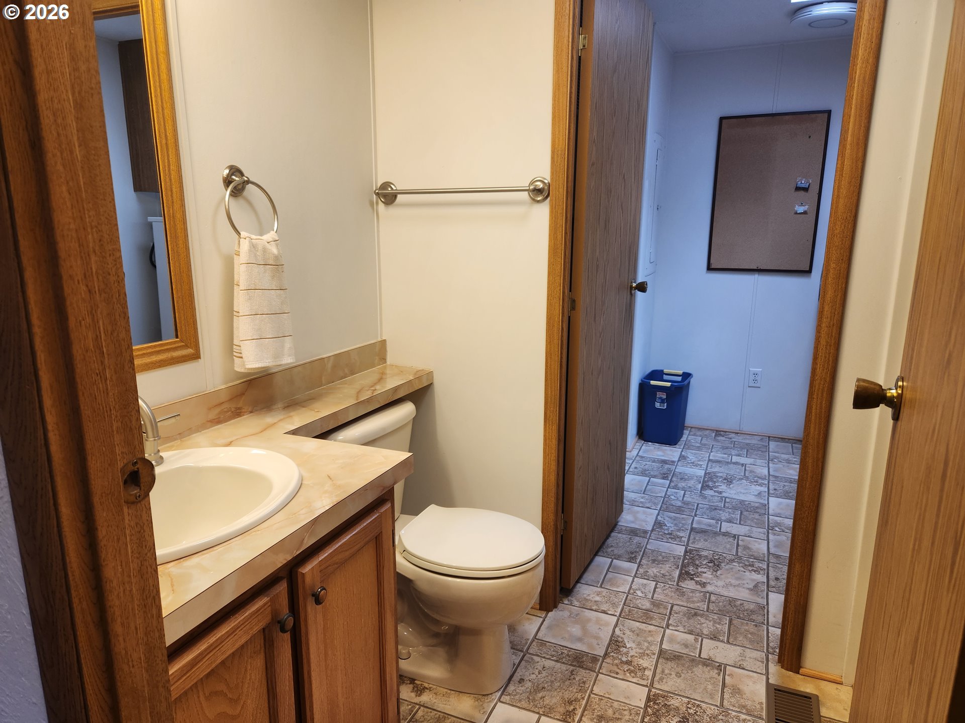 100 River Bend Road, Unit 24 Reedsport, OR 97467 - Photo 29 of 36 a bathroom with a sink a toilet and shower