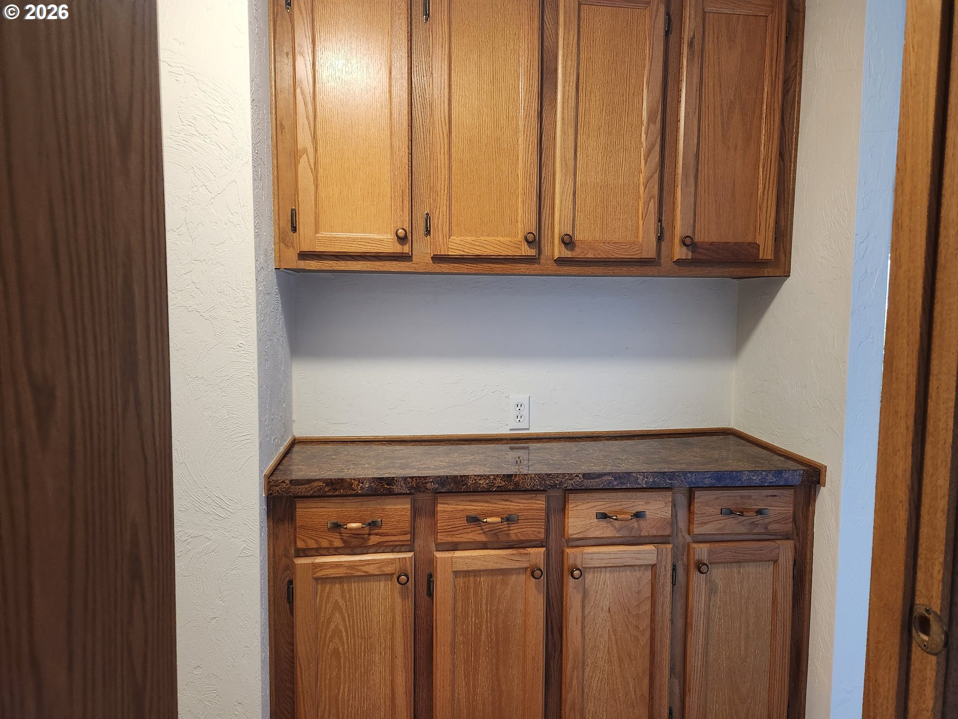 100 River Bend Road, Unit 24 Reedsport, OR 97467 - Photo 31 of 36 a close view of wooden cabinets