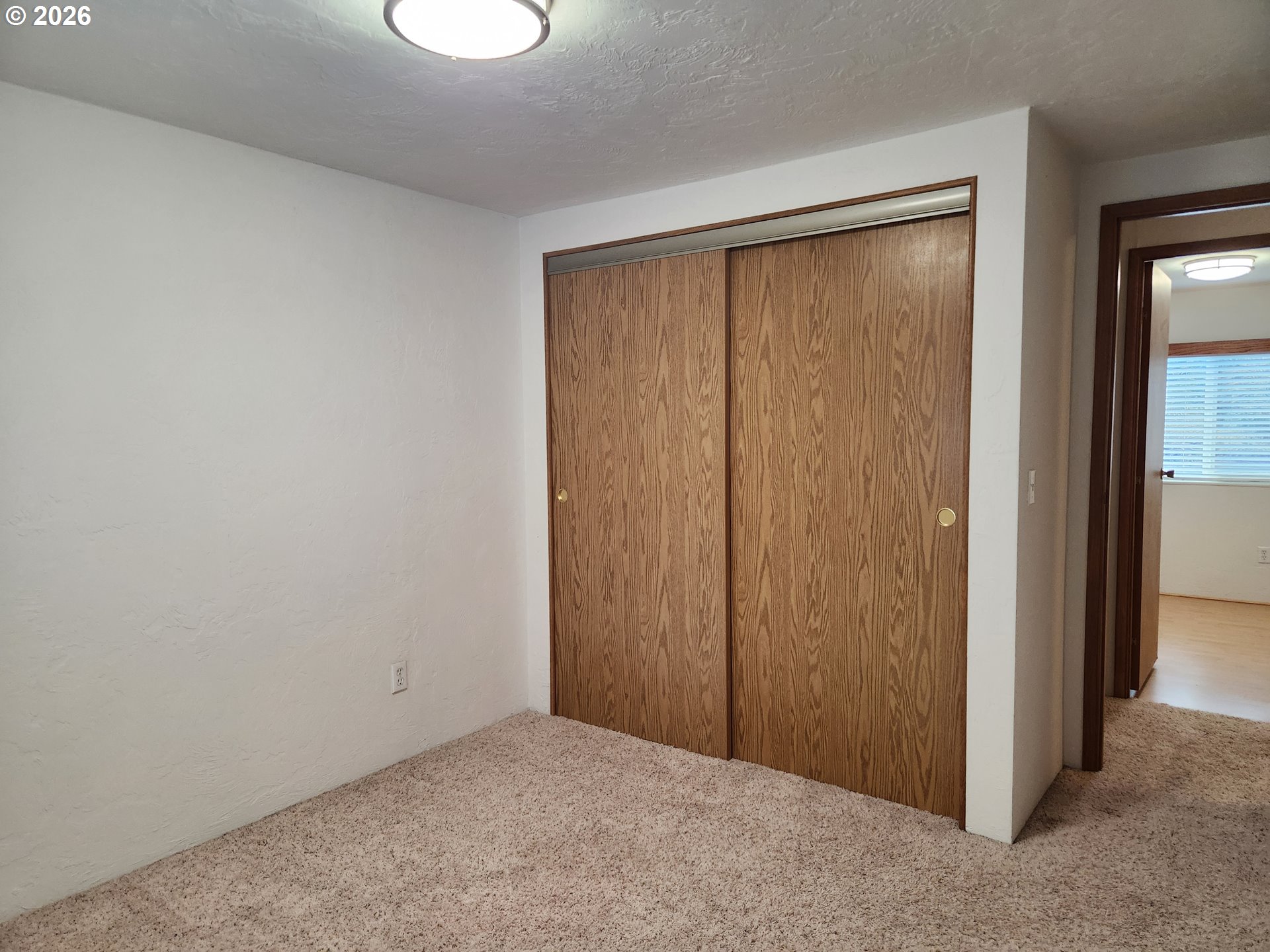 100 River Bend Road, Unit 24 Reedsport, OR 97467 - Photo 32 of 36 an empty room with a glass door and shower