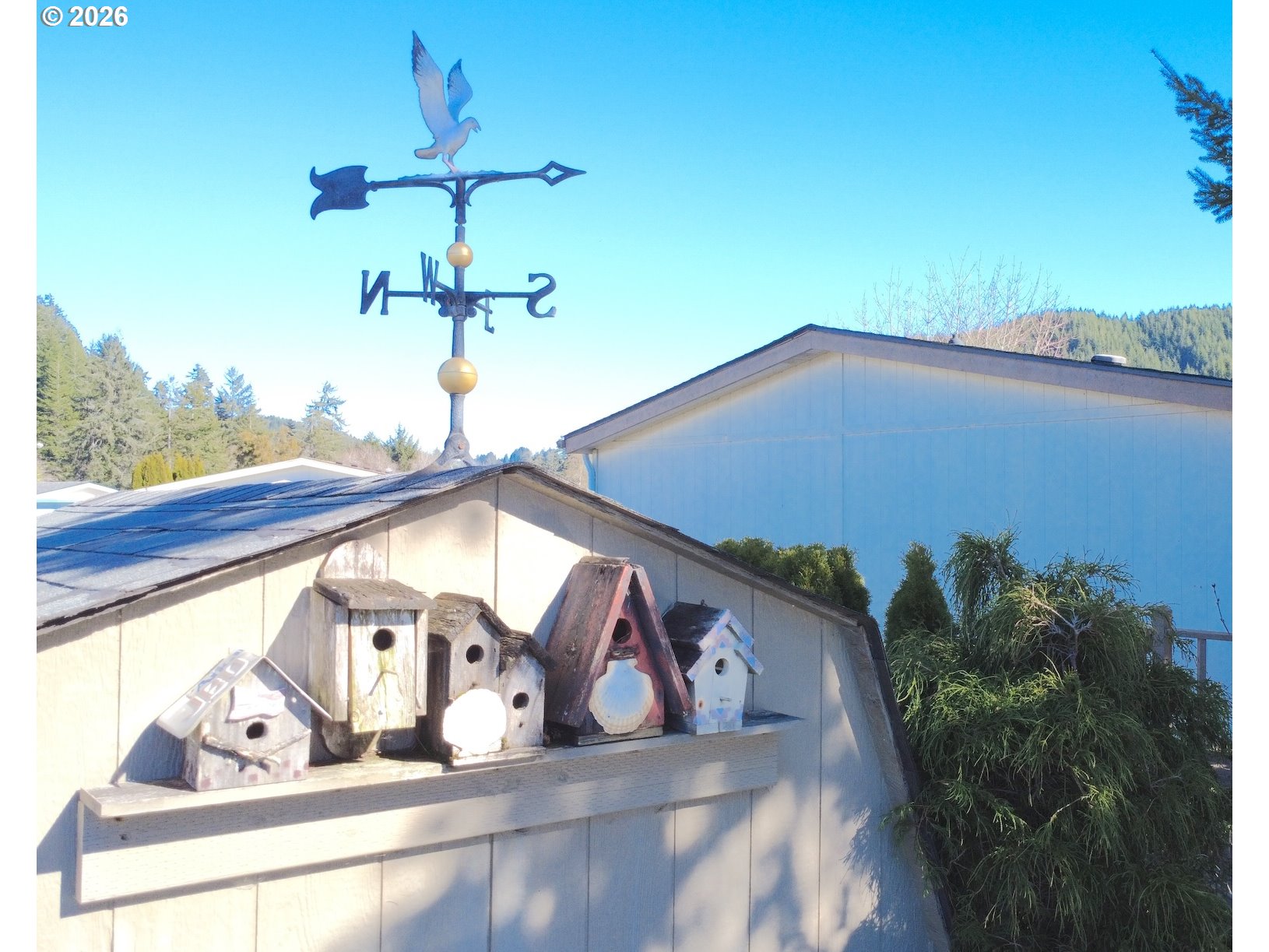 100 River Bend Road, Unit 24 Reedsport, OR 97467 - Photo 8 of 36 a view of a terrace with a table and chairs