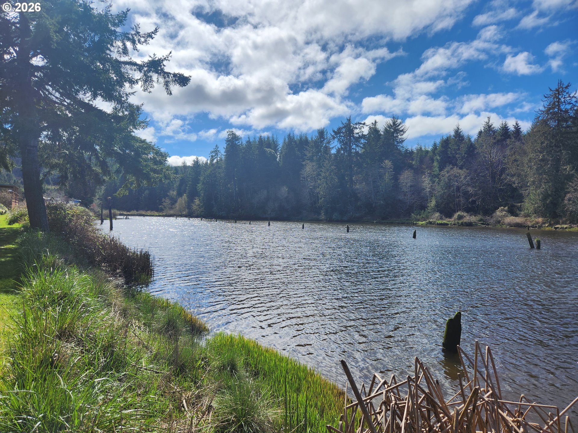 100 River Bend Road, Unit 24 Reedsport, OR 97467 - Photo 9 of 36 a view of pathway with a yard