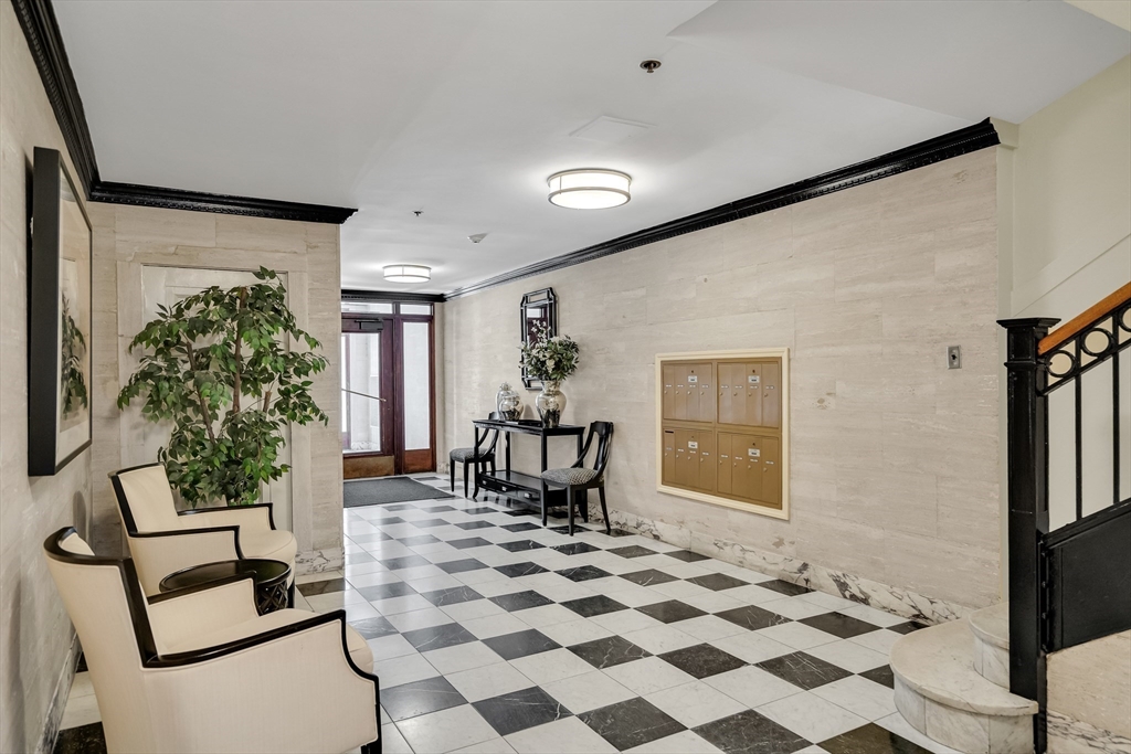 311 Commonwealth Avenue, Unit 71 Boston, MA 02115 - Photo 17 of 19 a bedroom with furniture and window