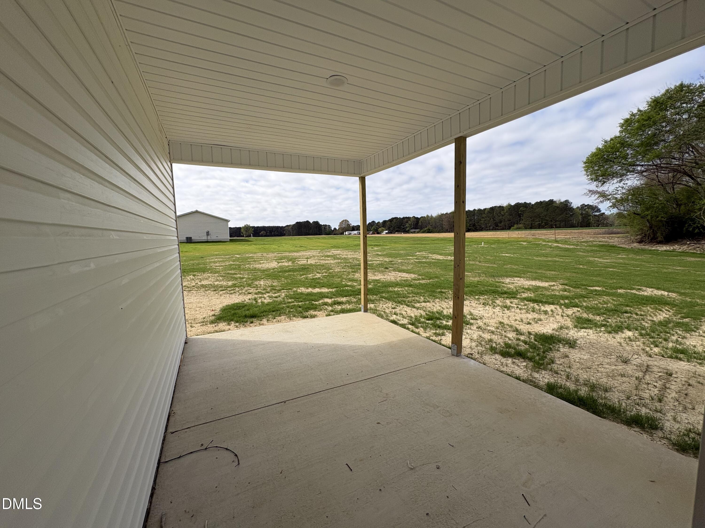 253 Jacobs Ridge Drive Four Oaks, NC 27524 - Photo 16 of 17 a view of a house with a ocean from a ceiling fan