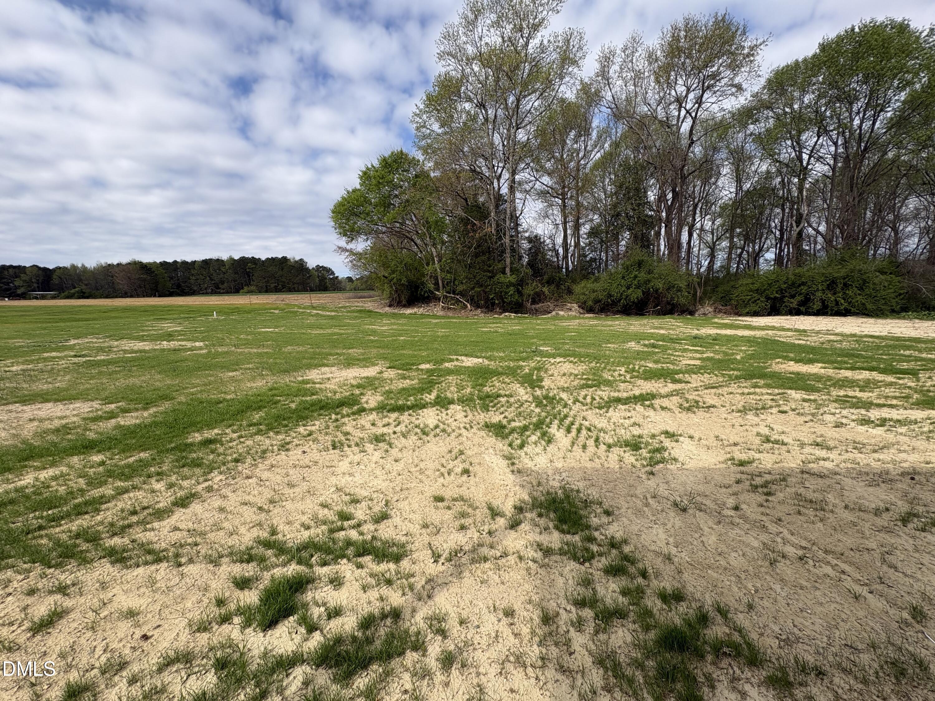 253 Jacobs Ridge Drive Four Oaks, NC 27524 - Photo 17 of 17 a view of an ocean beach