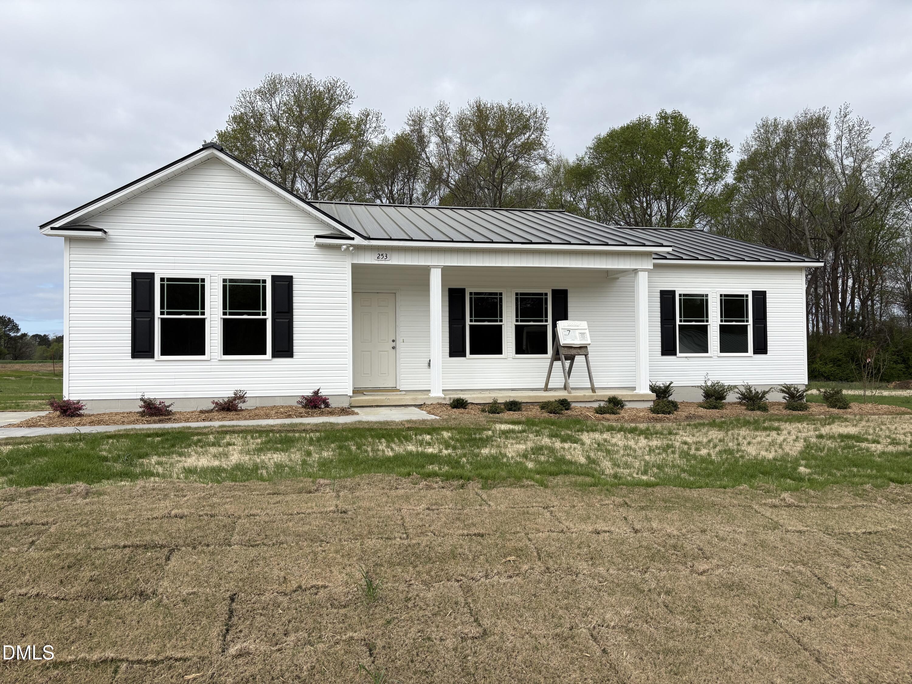 253 Jacobs Ridge Drive Four Oaks, NC 27524 - Photo 2 of 17 a view of a house with backyard