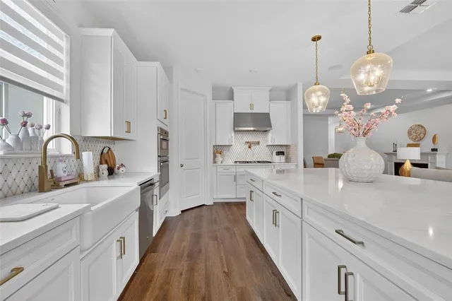 a bedroom with a bed and a television