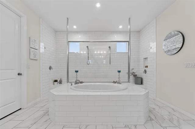 a view of a livingroom with furniture and a floor to ceiling window