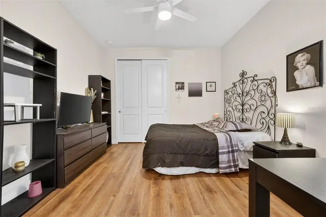an aerial view of a house with a garden and lake view