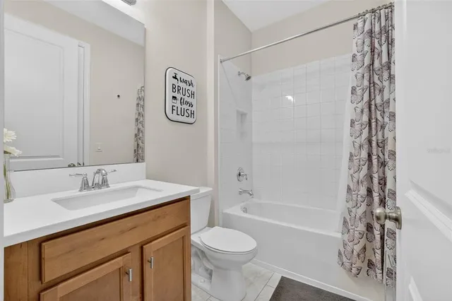 an aerial view of residential building and lake