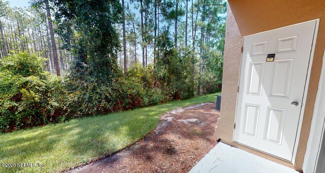 224 Larkin Place, Unit 103 St. Johns, FL 32259 - Photo 17 of 20 a view of backyard with green space