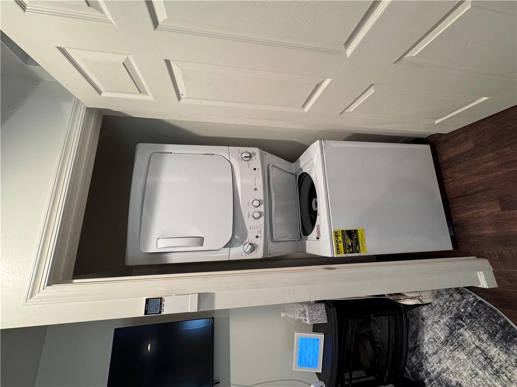 130 Hidden Spur Road Lehighton, PA 18235 - Photo 8 of 19 A convenient stacked washer and dryer setup optimizes space in this well-appointed utility area.