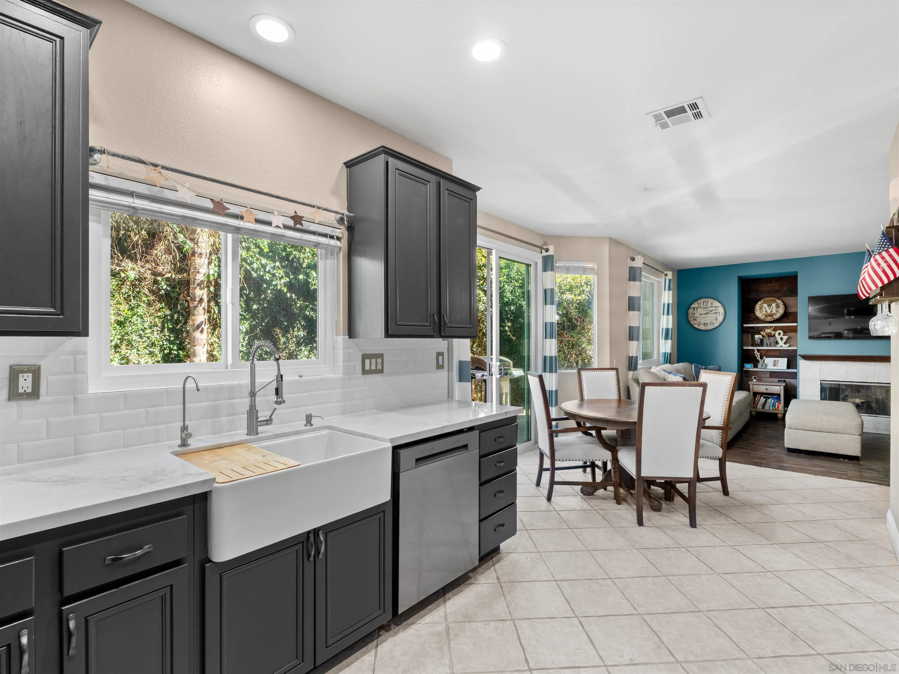 2925 Sunhaven Court Alpine, CA 91901 - Photo 6 of 19 a kitchen with a sink and chairs