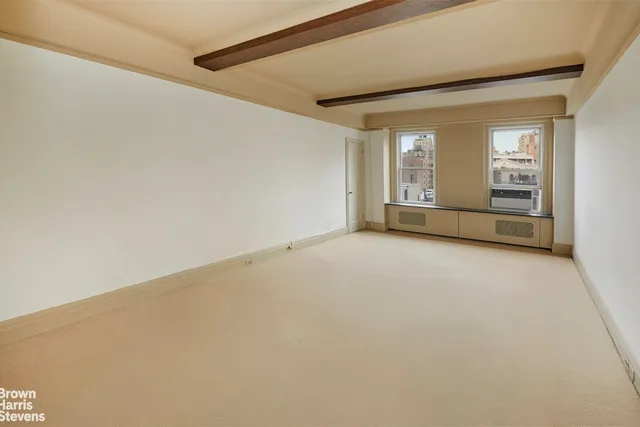 a large building with a city view