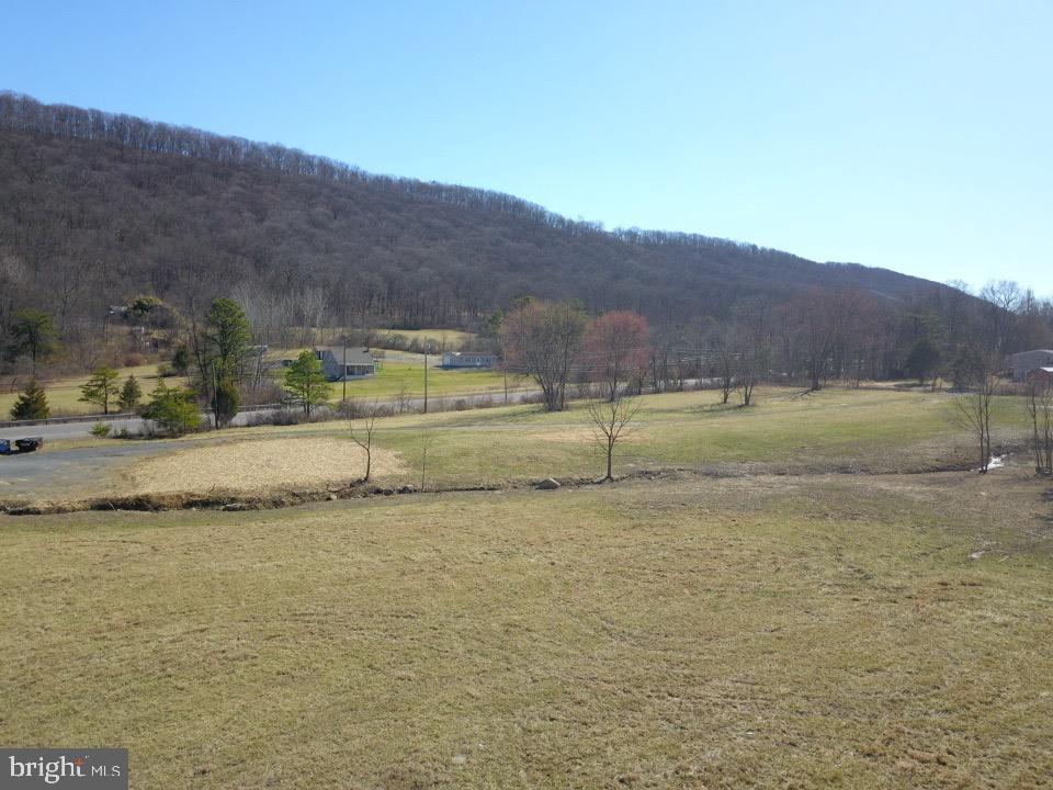 18712 Crossland Road Southwest Rawlings, MD 21557 - Photo 20 of 89 a view of a yard with an ocean