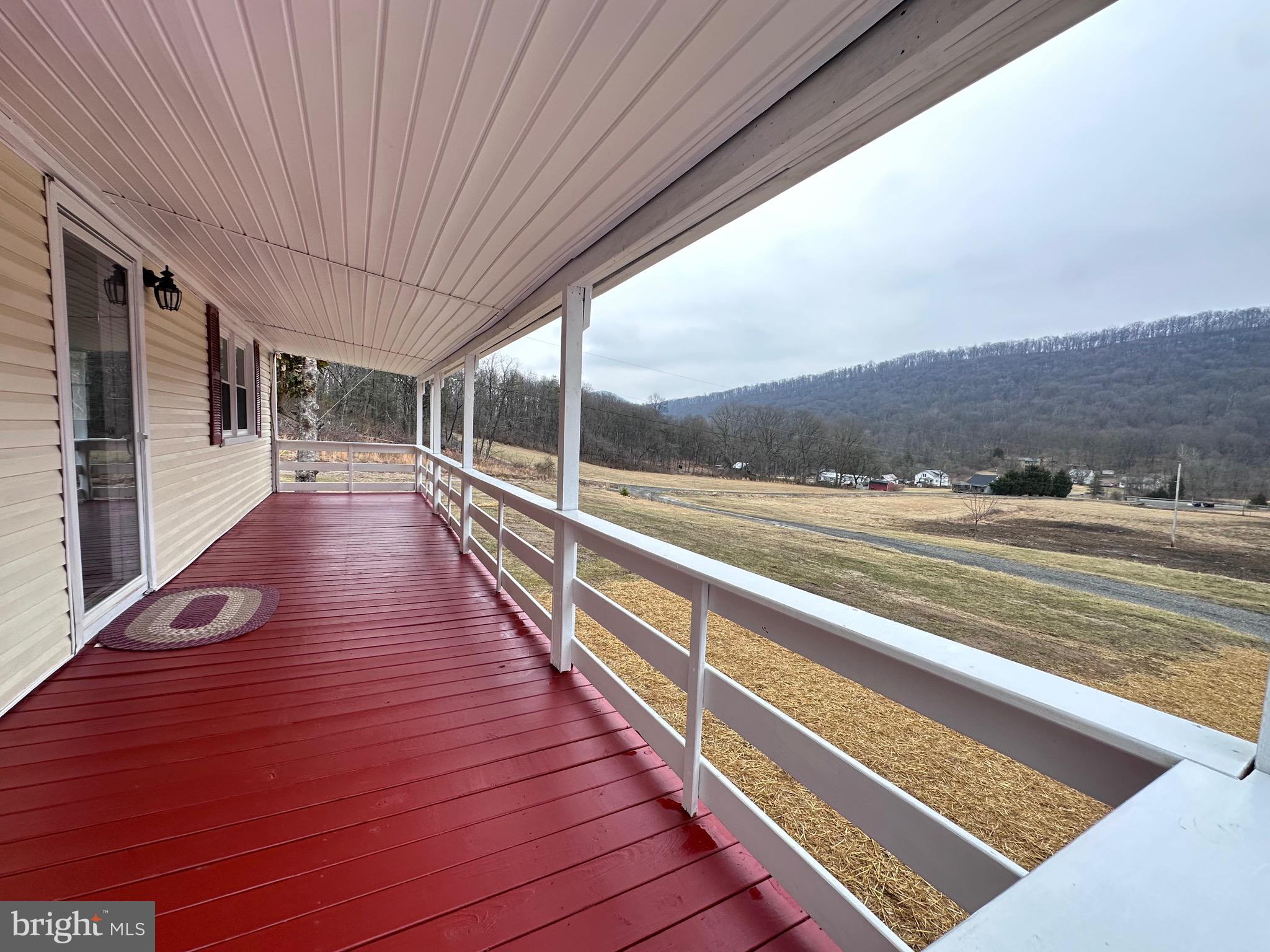 18712 Crossland Road Southwest Rawlings, MD 21557 - Photo 38 of 89 a view of balcony with wooden floor