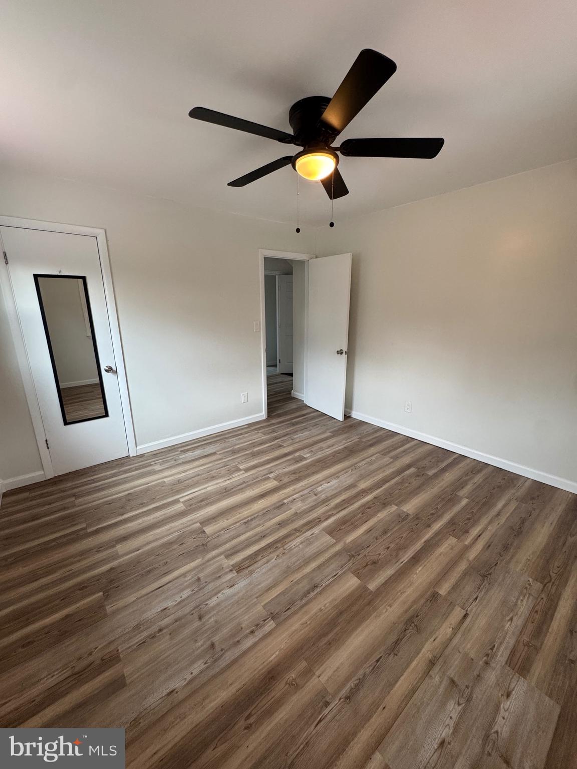 18712 Crossland Road Southwest Rawlings, MD 21557 - Photo 57 of 89 a view of empty room with wooden floor