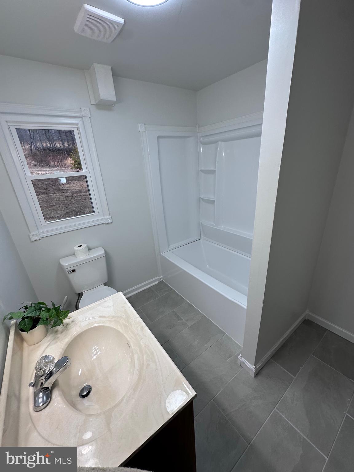 18712 Crossland Road Southwest Rawlings, MD 21557 - Photo 67 of 89 a bathroom with a sink a toilet and shower
