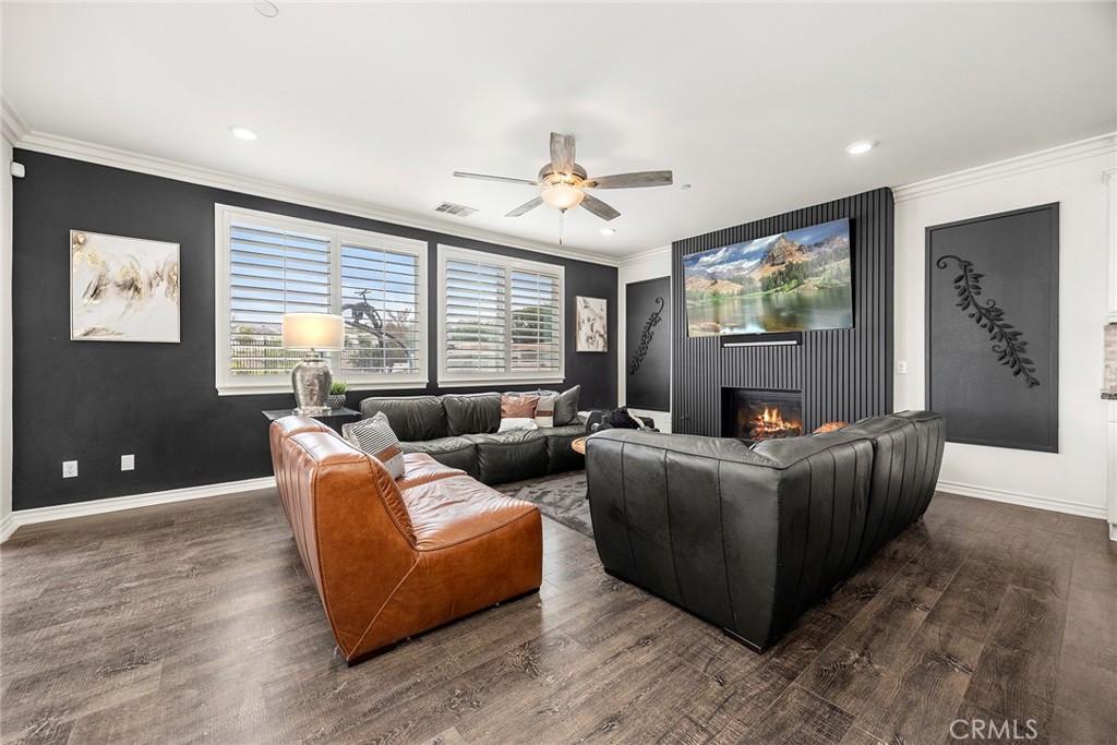 13734 Sweet Avenue Riverside, CA 92503 - Photo 13 of 75 Family Room- With Custom Contemporary Slats enclosure built around the fireplace.