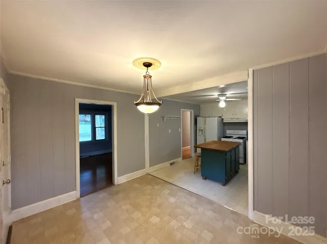 a view of livingroom with washer and dryer