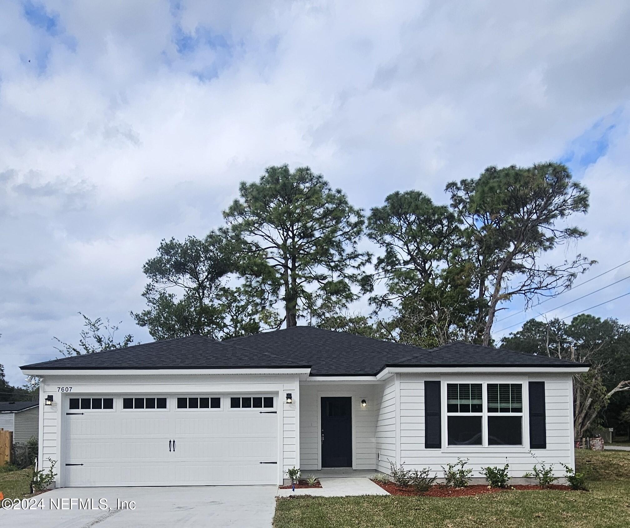 7607 Del Road Jacksonville, FL 32244 - Photo 1 of 15 aerial view of house with yard and entertaining space