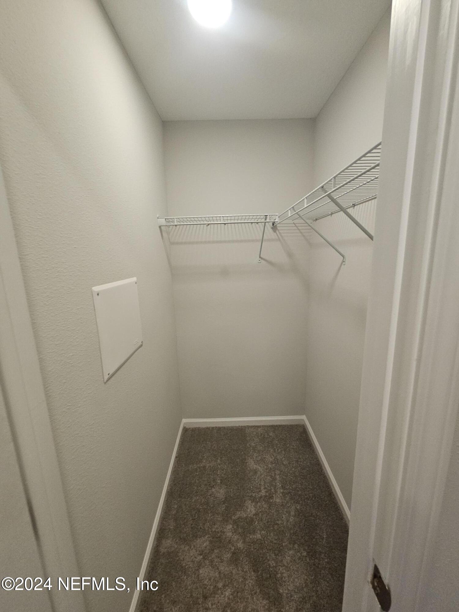 7607 Del Road Jacksonville, FL 32244 - Photo 10 of 15 a view of a room with racks on the wall
