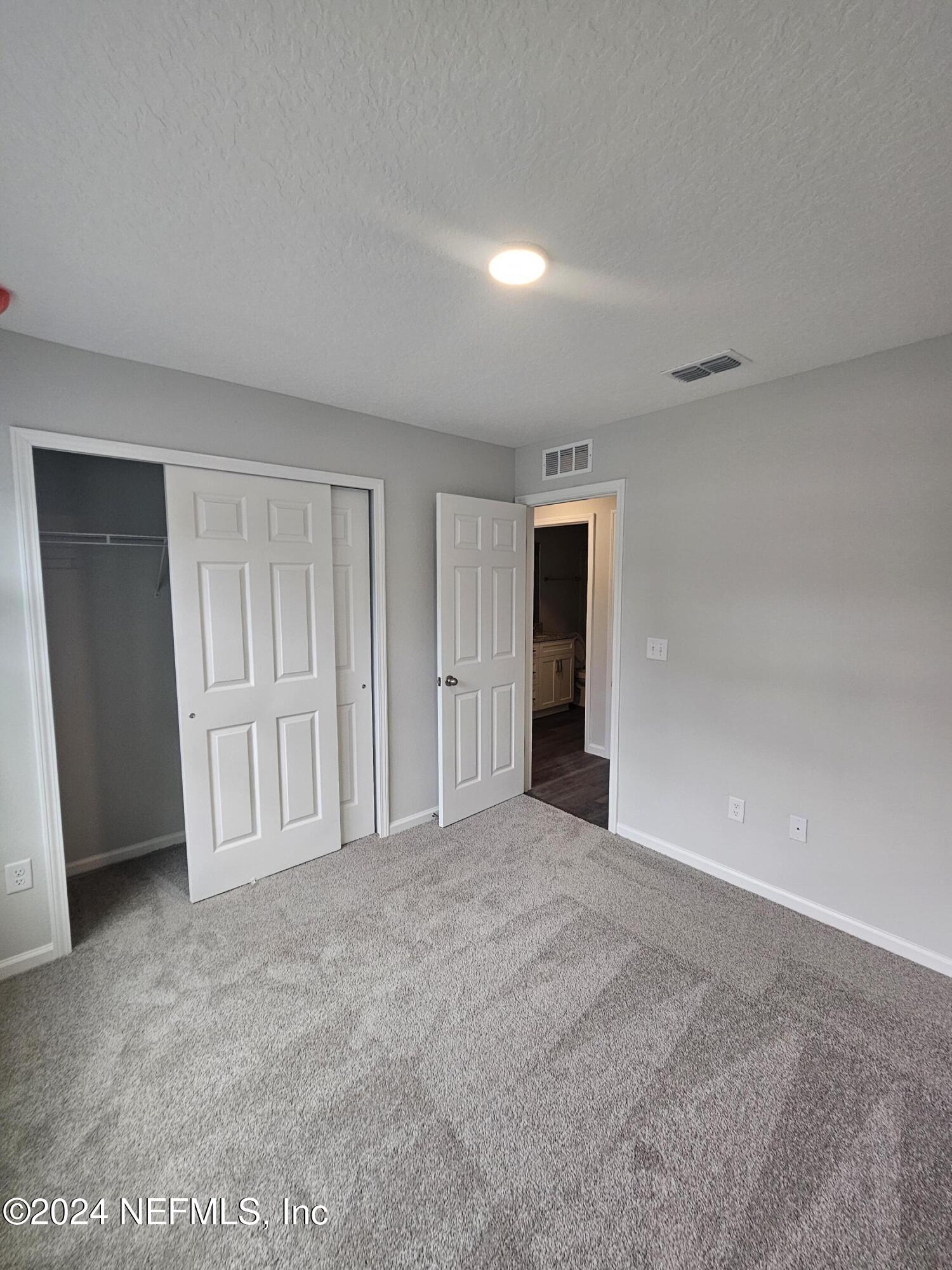 7607 Del Road Jacksonville, FL 32244 - Photo 7 of 15 a view of an empty room with closet